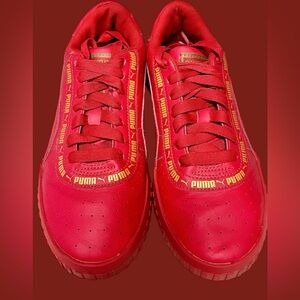 Puma sneakers Red with yellow logo. Ladies sz 6. EUC